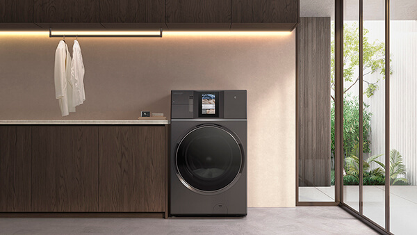 Combi washer dryer in laundry setting with timber cabinetry